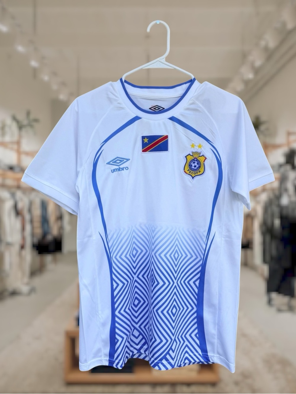 Umbro DR Congo White and Blue Men's Football Jersey with Geometric Pattern